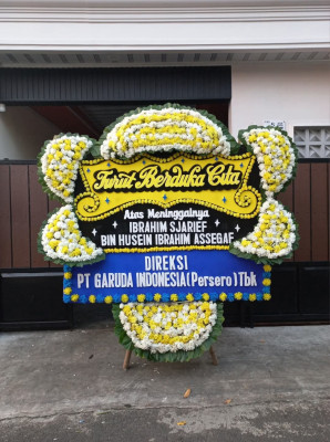 Papan Bunga Duka di Simpang Hilir