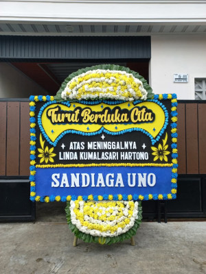 Papan Bunga Duka di Simpang Hilir
